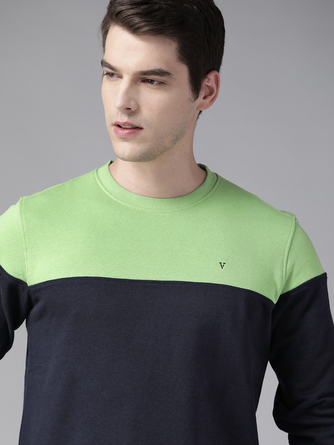 

Van Heusen Men Green & Navy Blue Colourblocked Sweatshirt