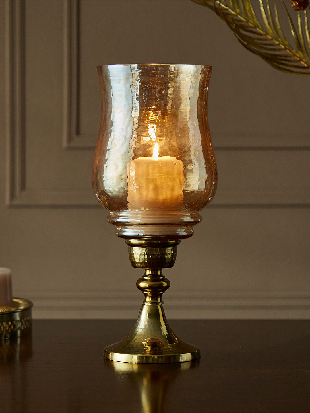 

Home Centre Fables Glass and Iron Hurricane Holder, Gold