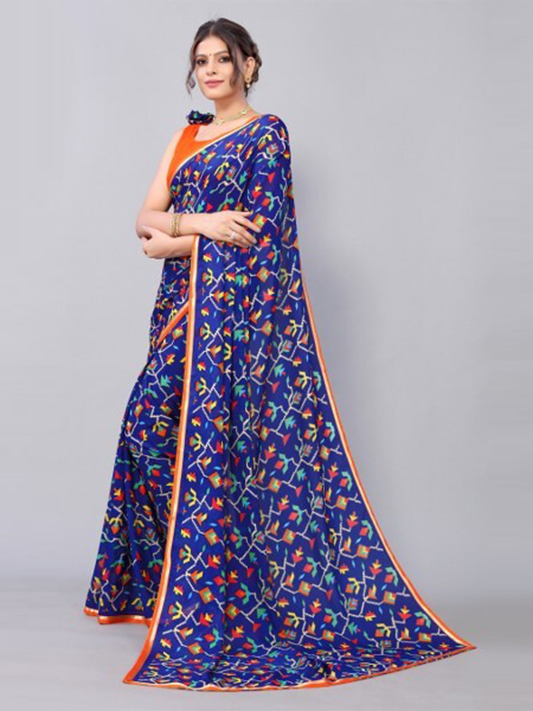 

Yashika Navy Blue & Orange Floral Georgette Saree