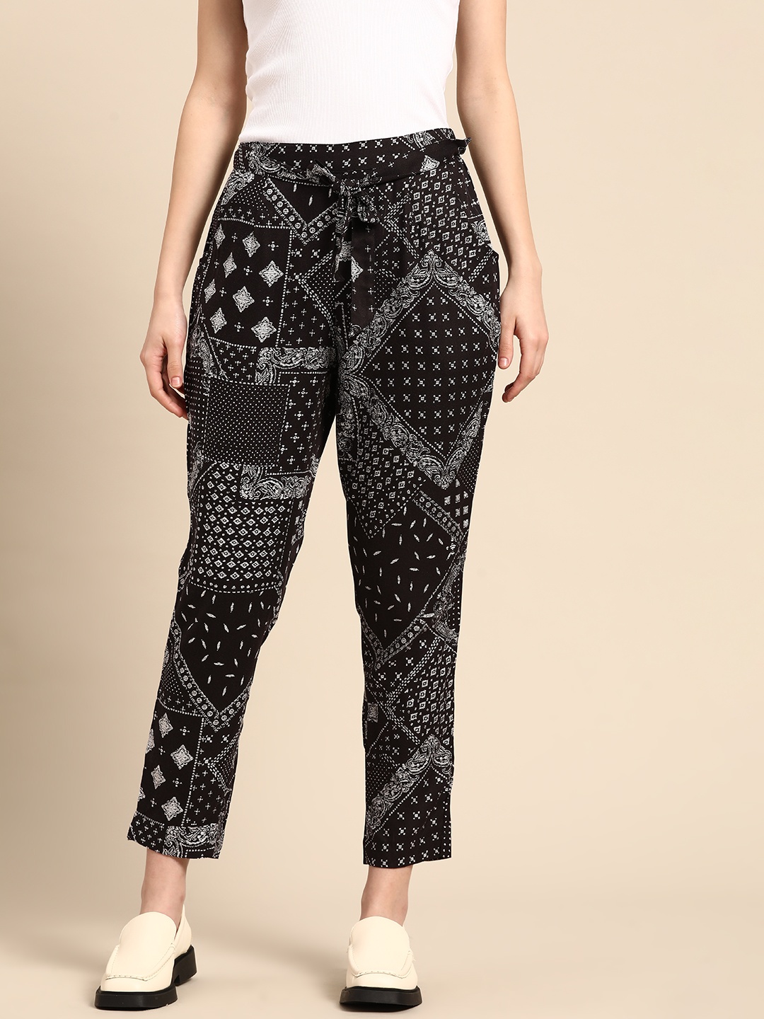 

Sangria Women Black Ethnic Motifs Printed Trousers