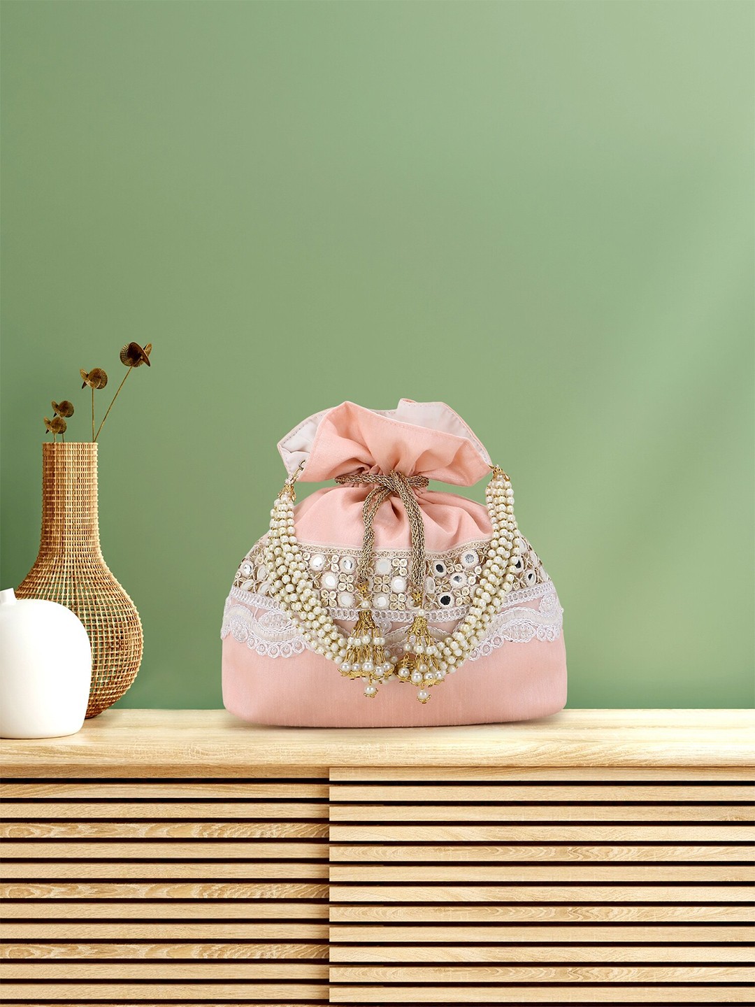 

Anekaant Pink & White Embellished Tasselled Potli Clutch