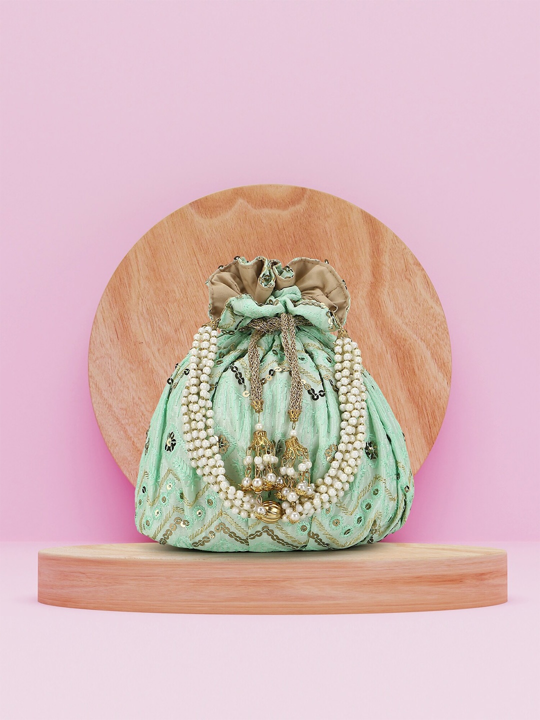 

Anekaant Green & Gold-Toned Embellished Tasselled Potli Clutch