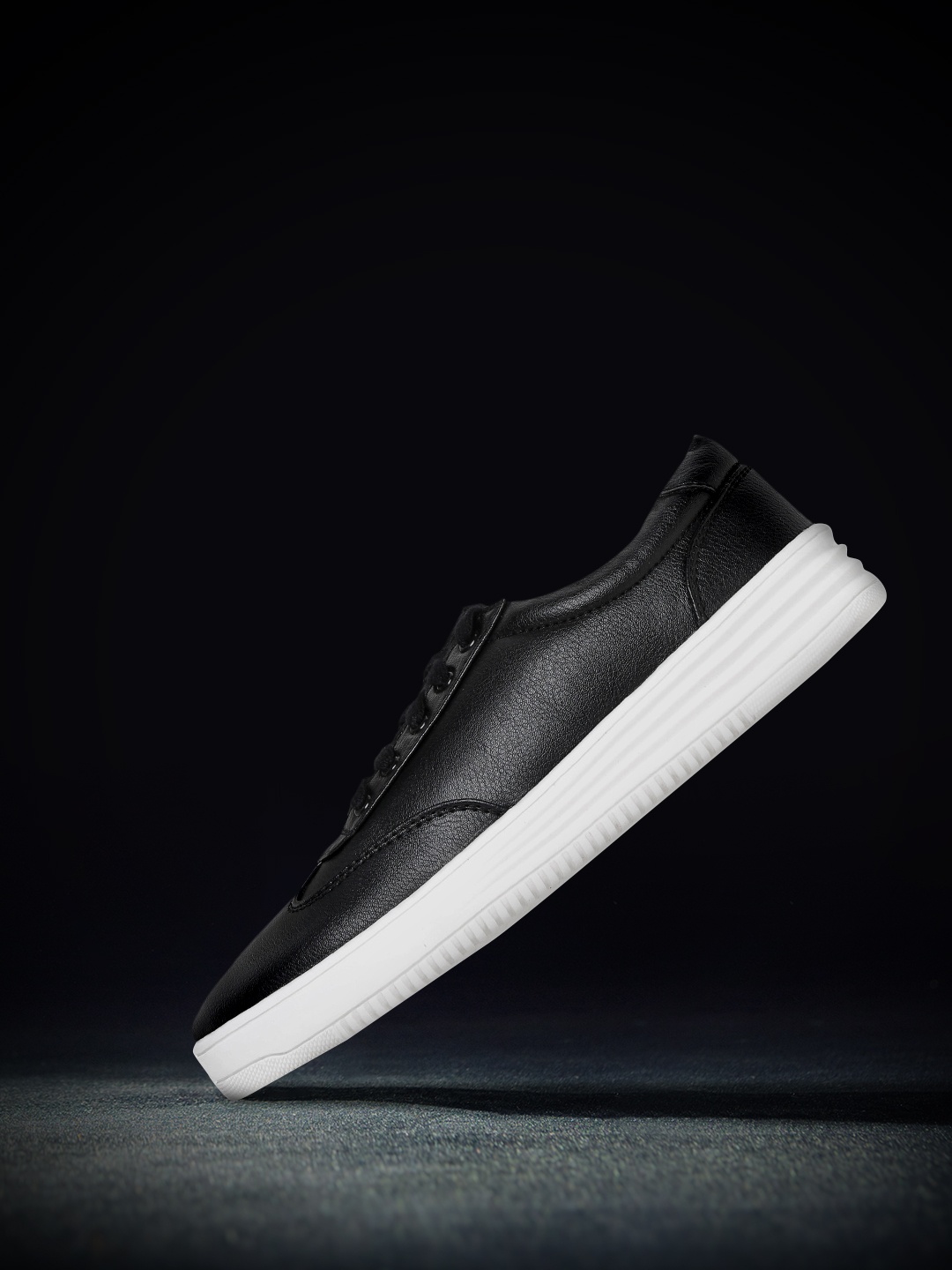 

Roadster Women Black Sneakers