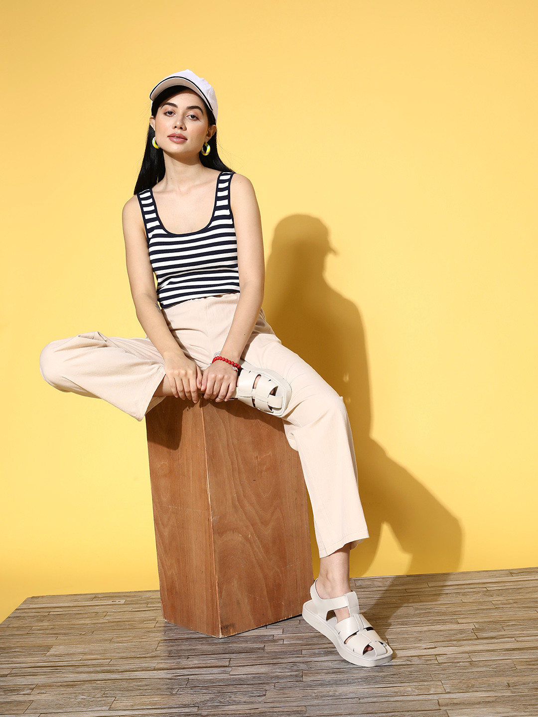 

Berrylush Women Beige Solid Wide Leg Trousers