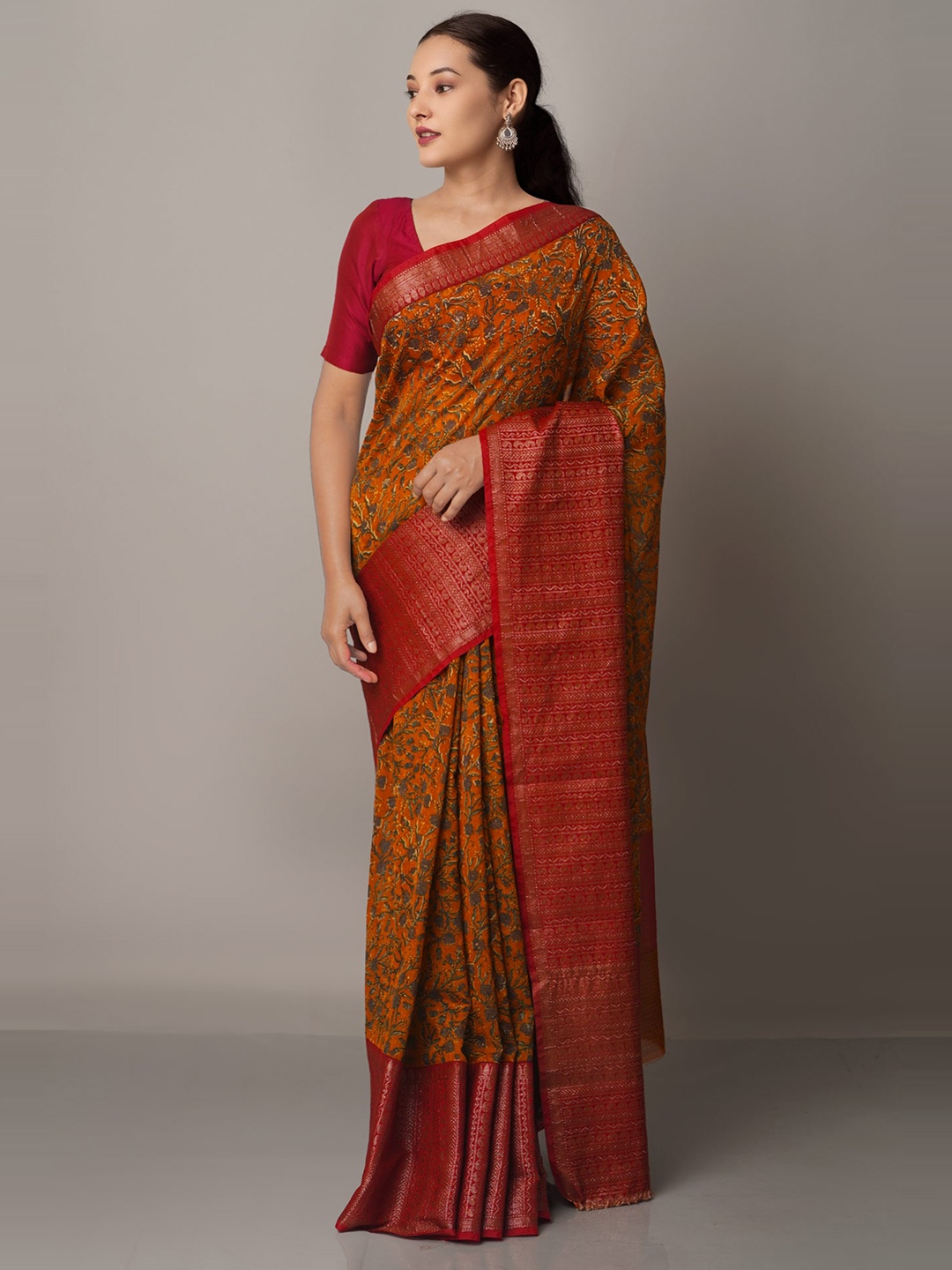 

Unnati Silks Orange Block Printed Maheshwari Sico Saree