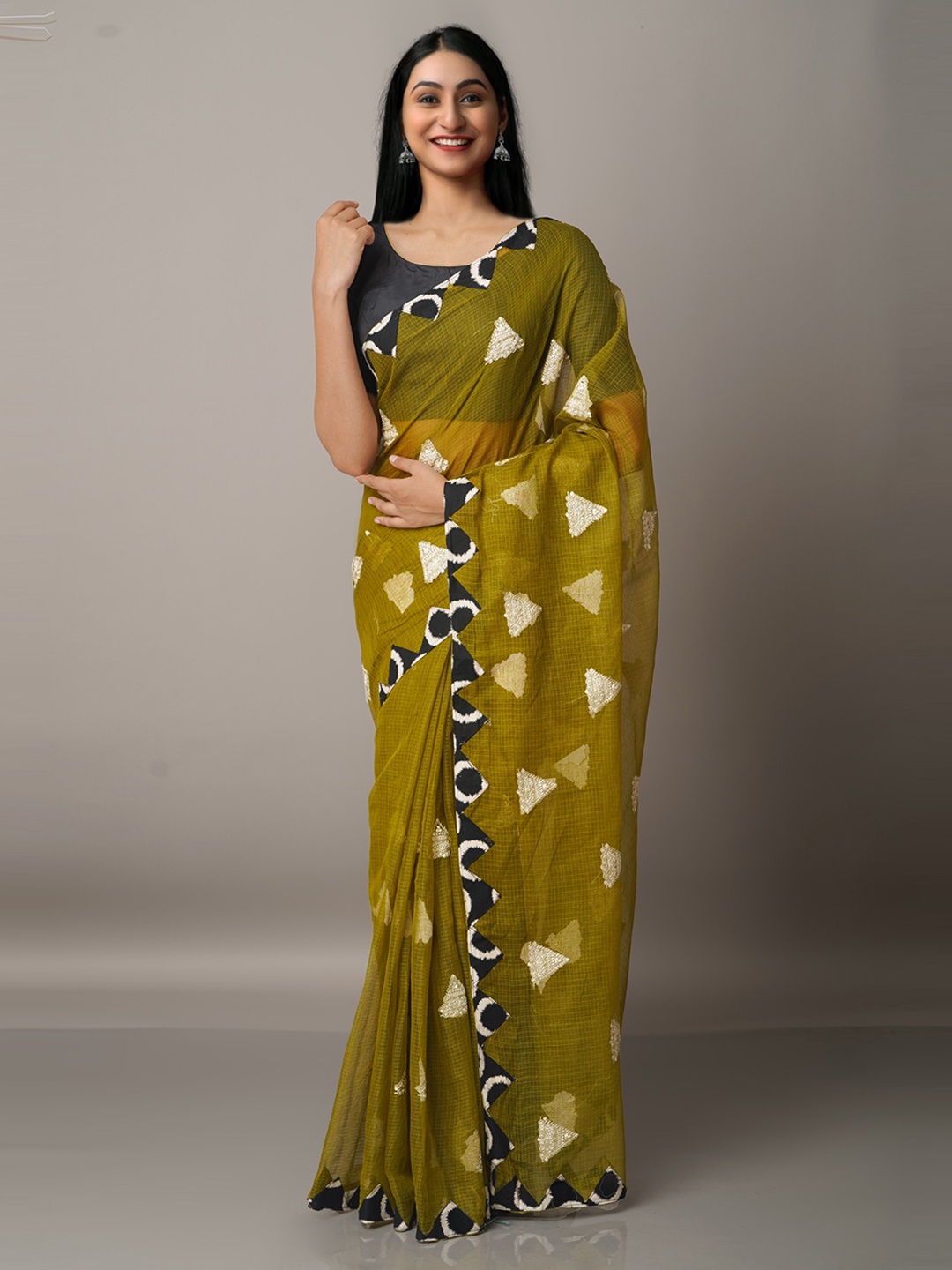 

Unnati Silks Green Cross Stitched Embroidered Supernet Saree