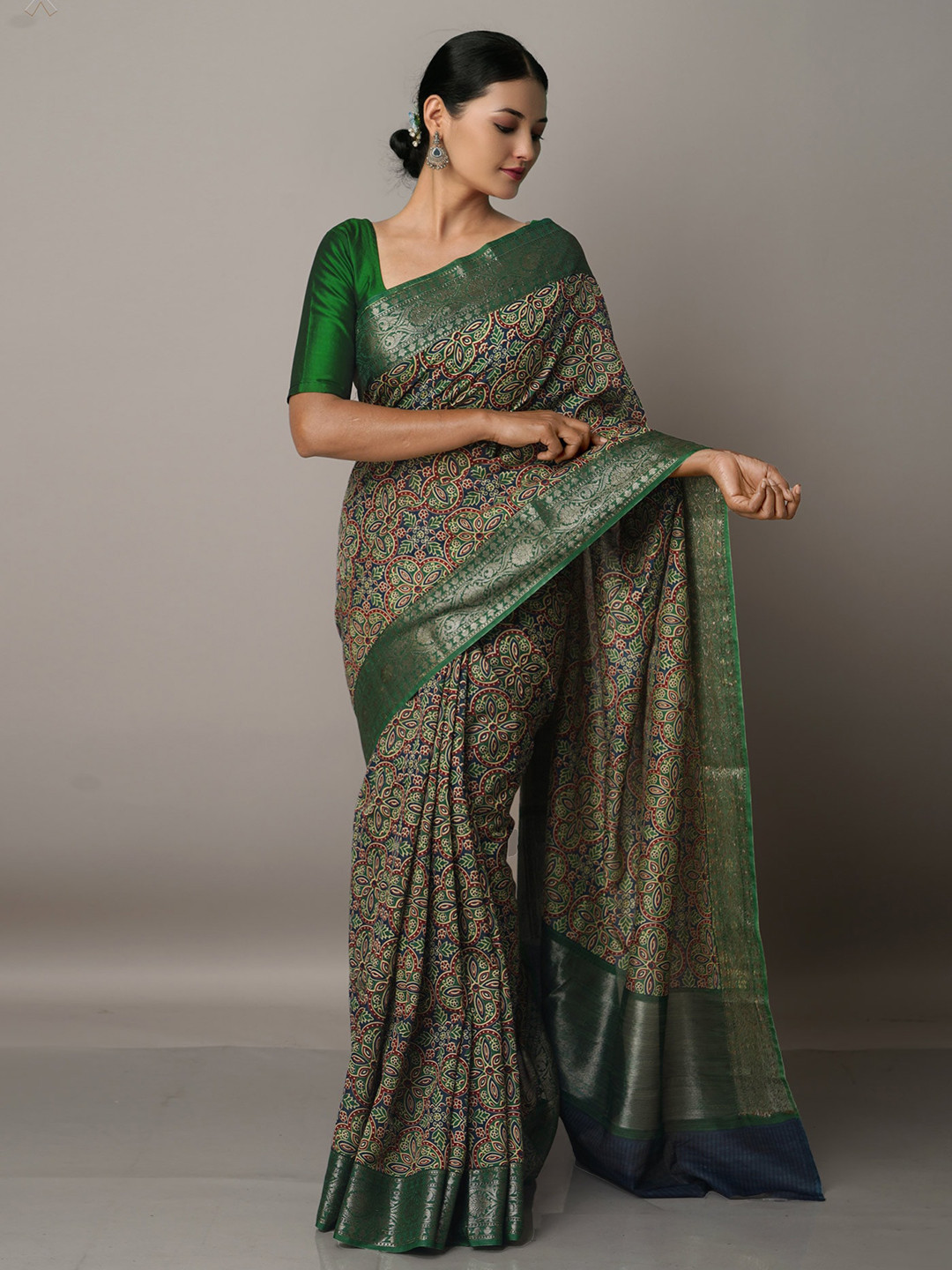 

Unnati Silks Green Ajrakh Printed Maheshwari Sico Saree