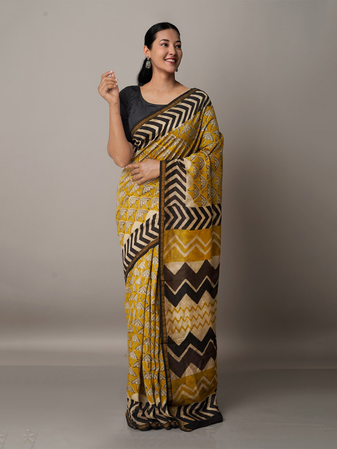

Unnati Silks Yellow & Gold-Toned Dabu Zari Silk Cotton Chanderi Saree