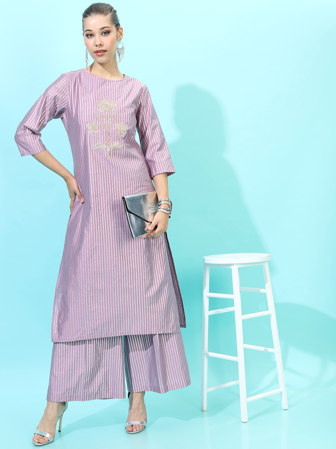 

Vishudh Women Purple Striped Kurta with Palazzos