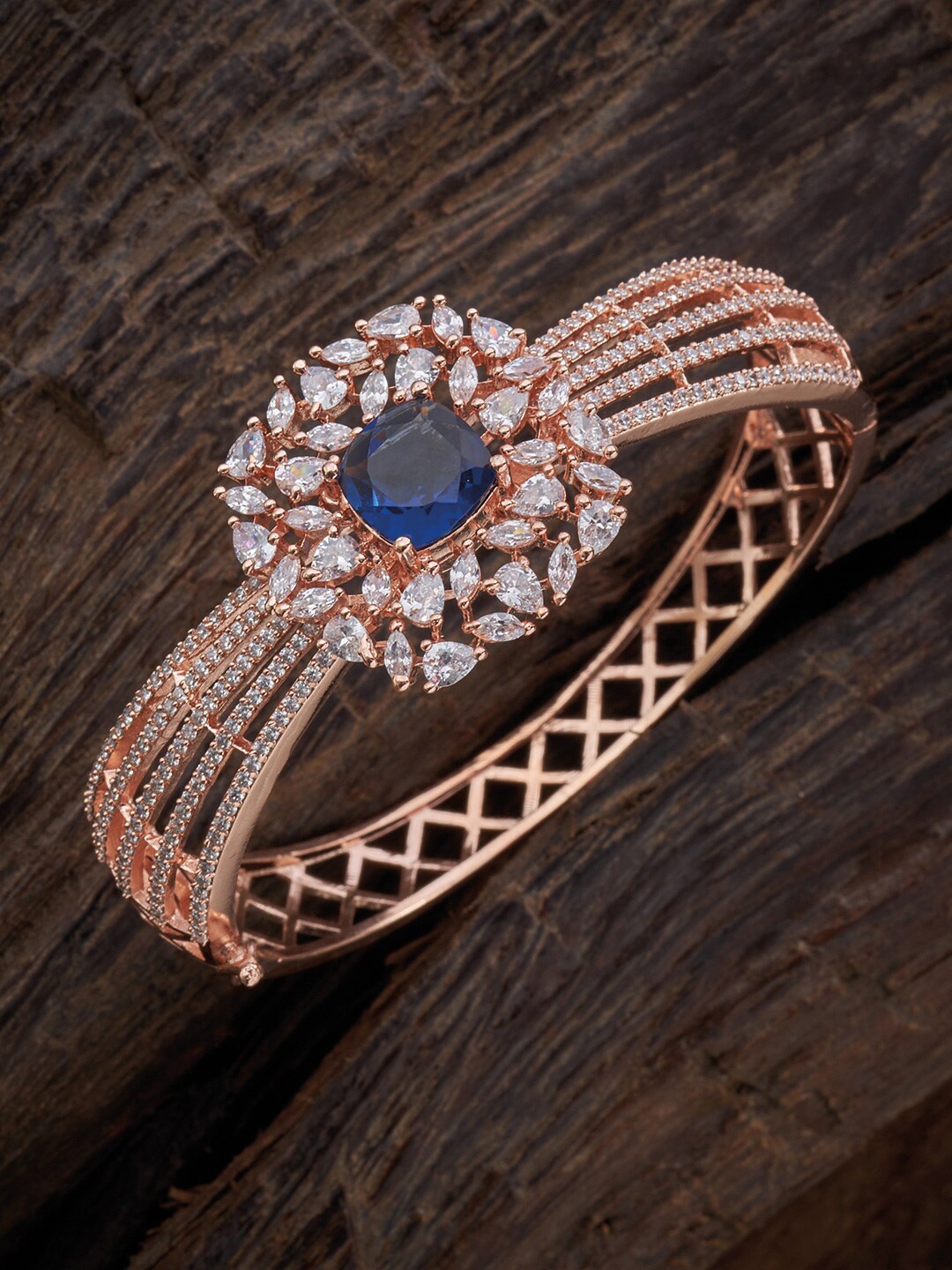 

Kushal's Fashion Jewellery Women Rose Gold-Plated & Blue Cubic Zirconia Kada Bracelet