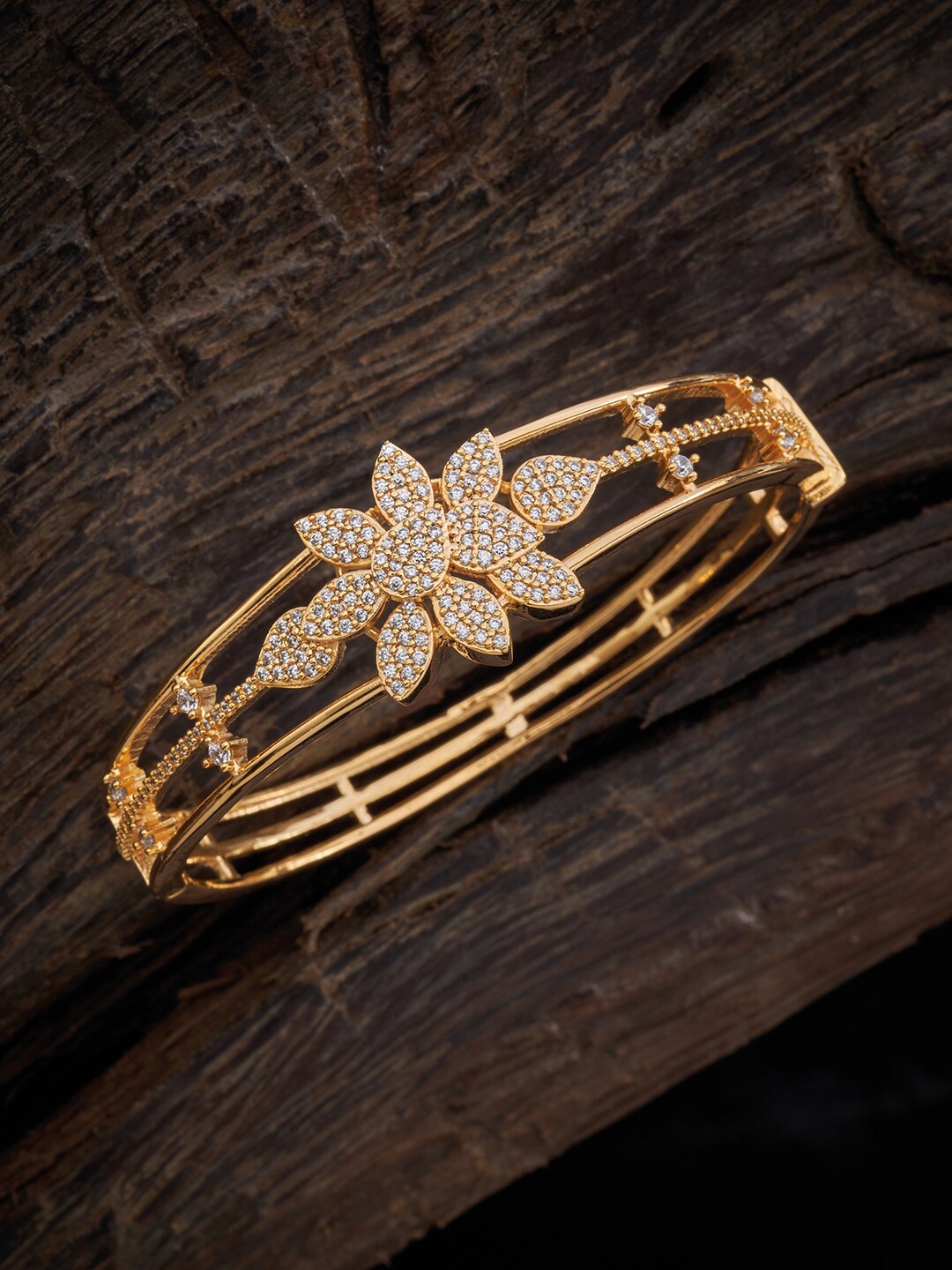 

Kushal's Fashion Jewellery Women Gold-Toned & White Cubic Zirconia Gold-Plated Kada Bracelet