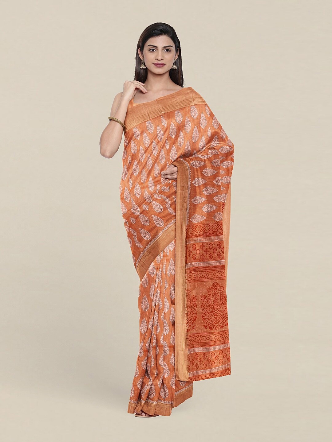 

Pothys Peach-Coloured & White Floral Zari Saree
