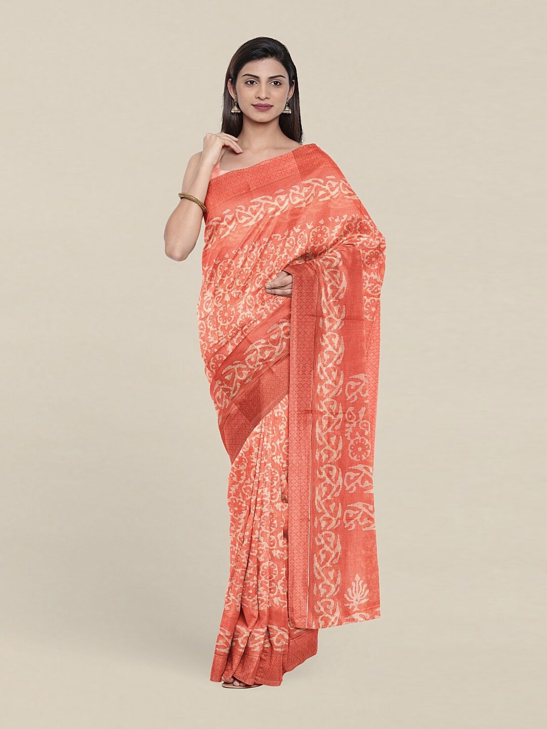 

Pothys Peach-Coloured & White Floral Saree