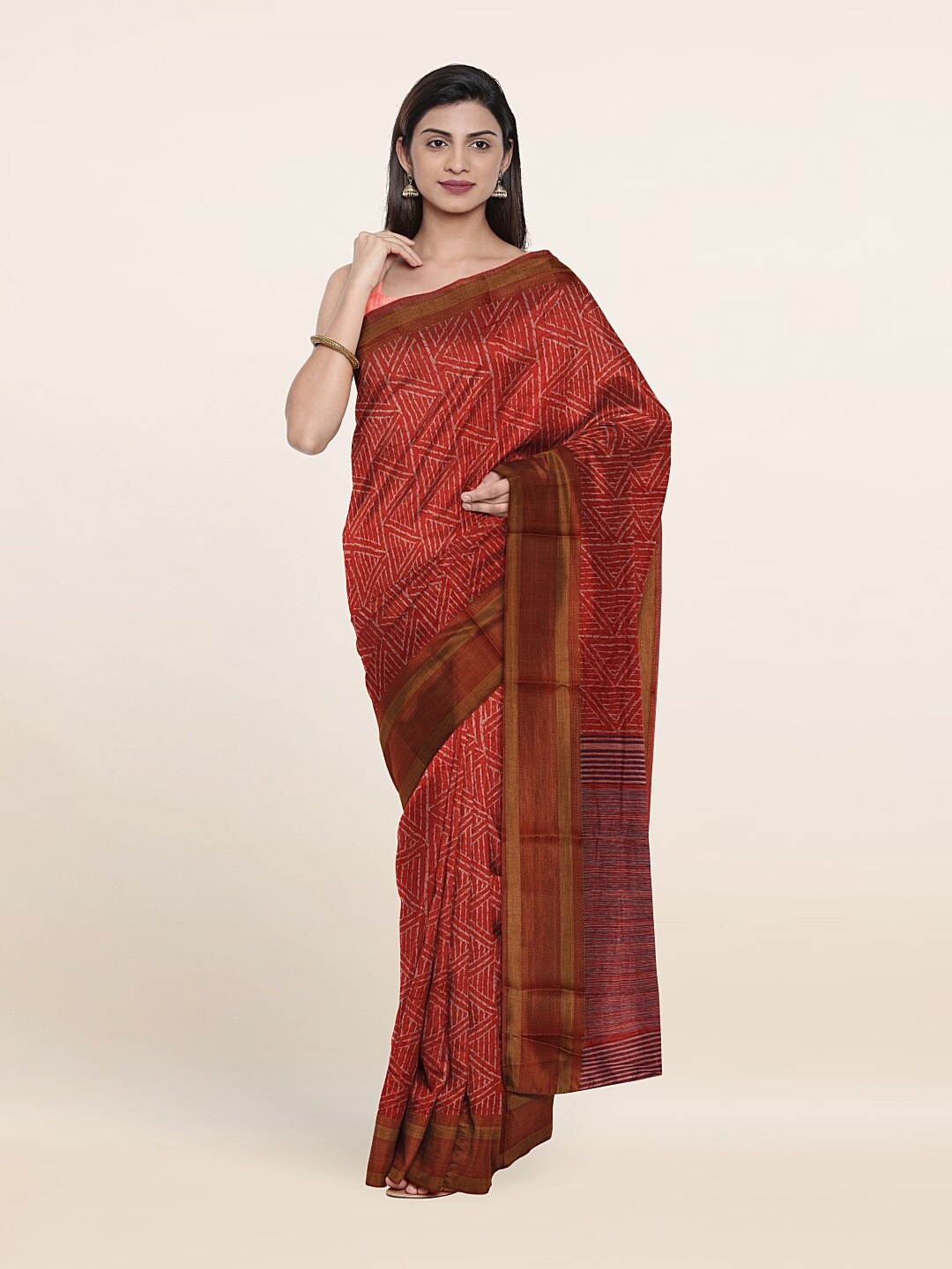 

Pothys Rust Printed Cotton Blend Saree