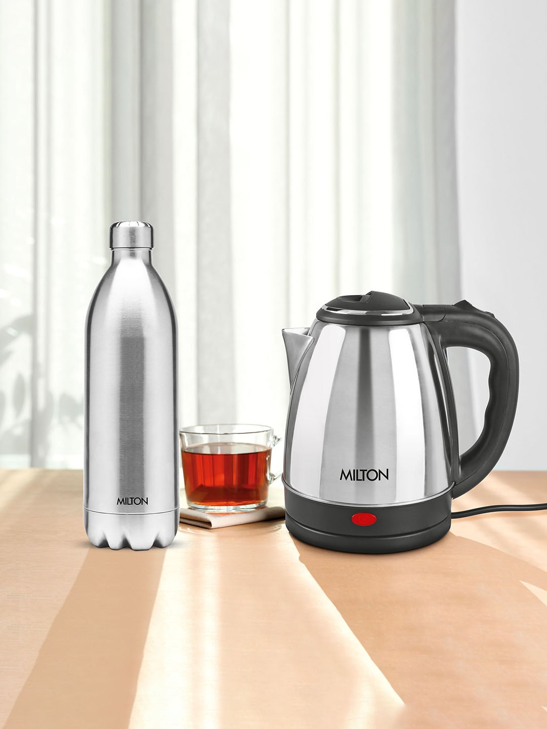 

Milton Set of 2 Silver Go Electro 2 Ltrs Kettle & Duo DLX 1.8 Ltrs with Jacket