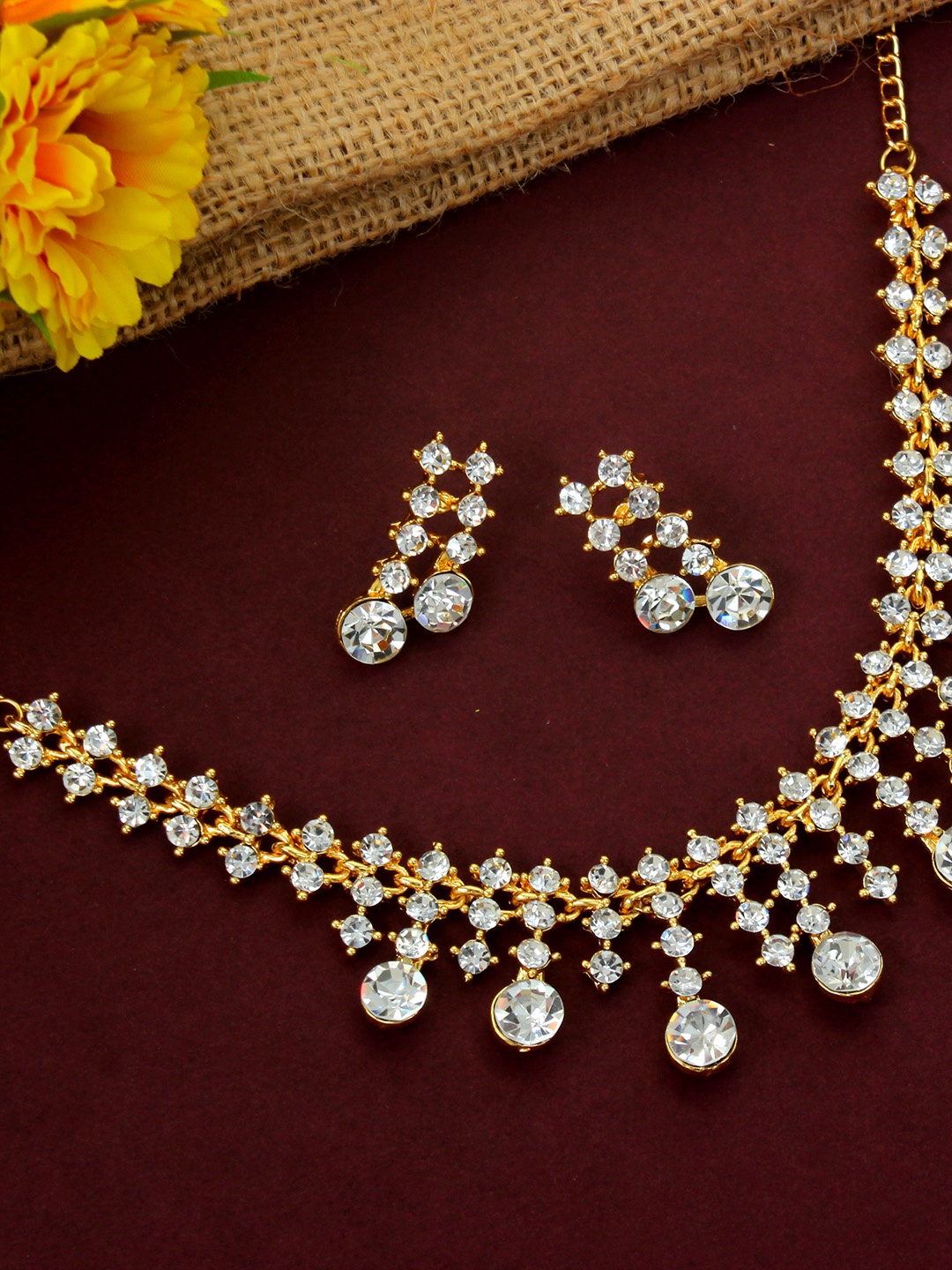 

Atasi International Gold-Plated White Stone-Studded Choker Jewellery Set