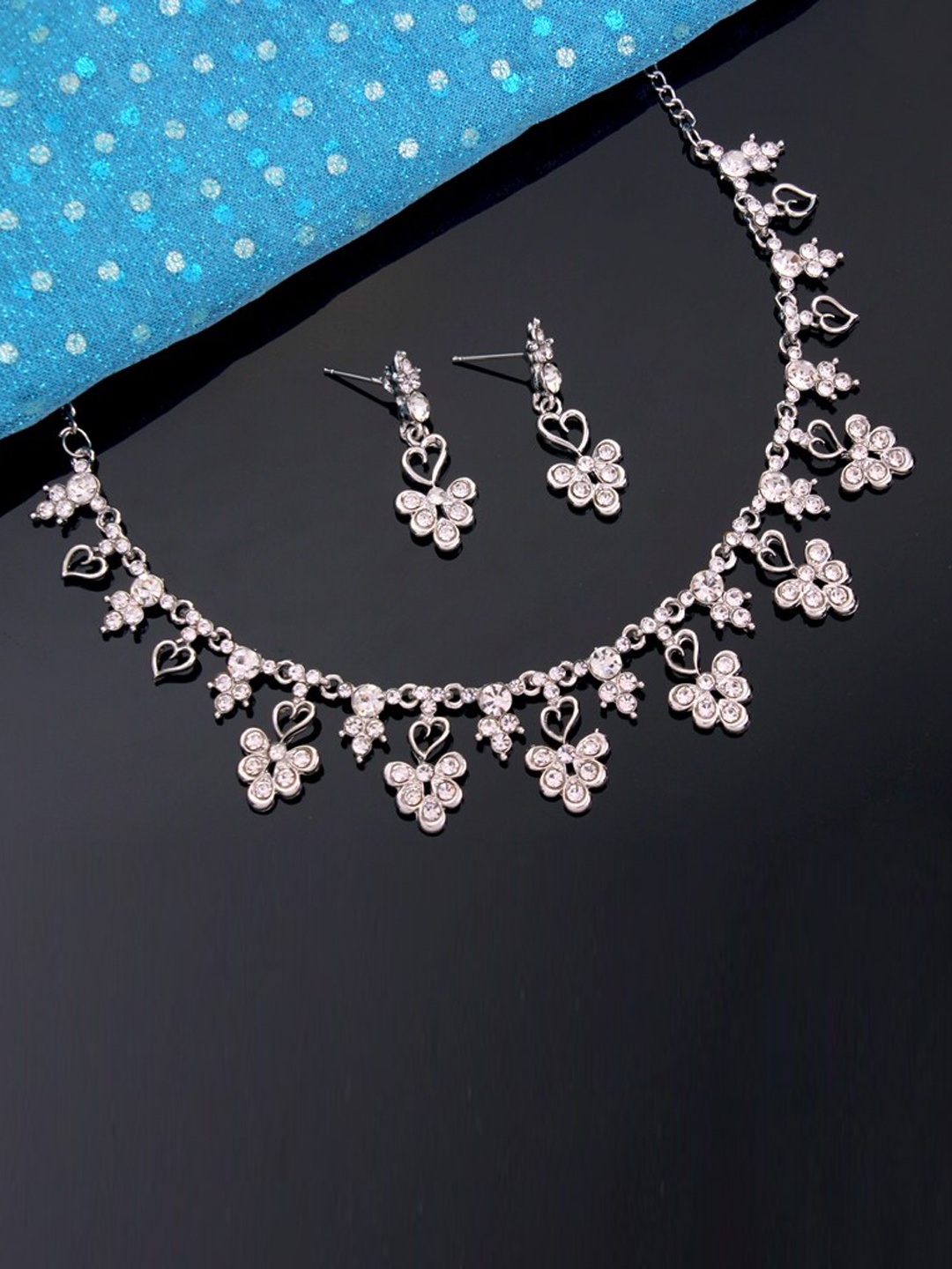 

Atasi International Women Silver Plated & White Crystal Studded Jewellery Set