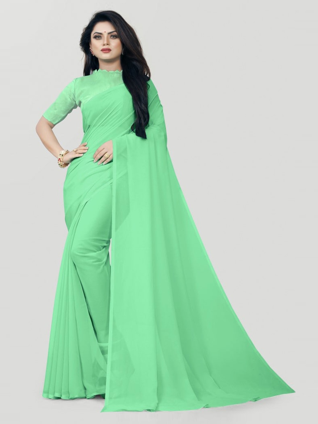 

CLOMITA Green Solid Pure Georgette Saree