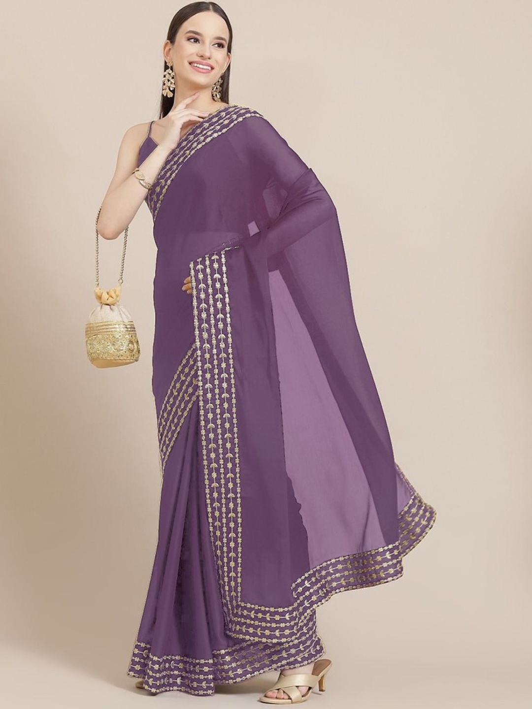 

Clomita Women Purple Embroidered Pure Silk Saree