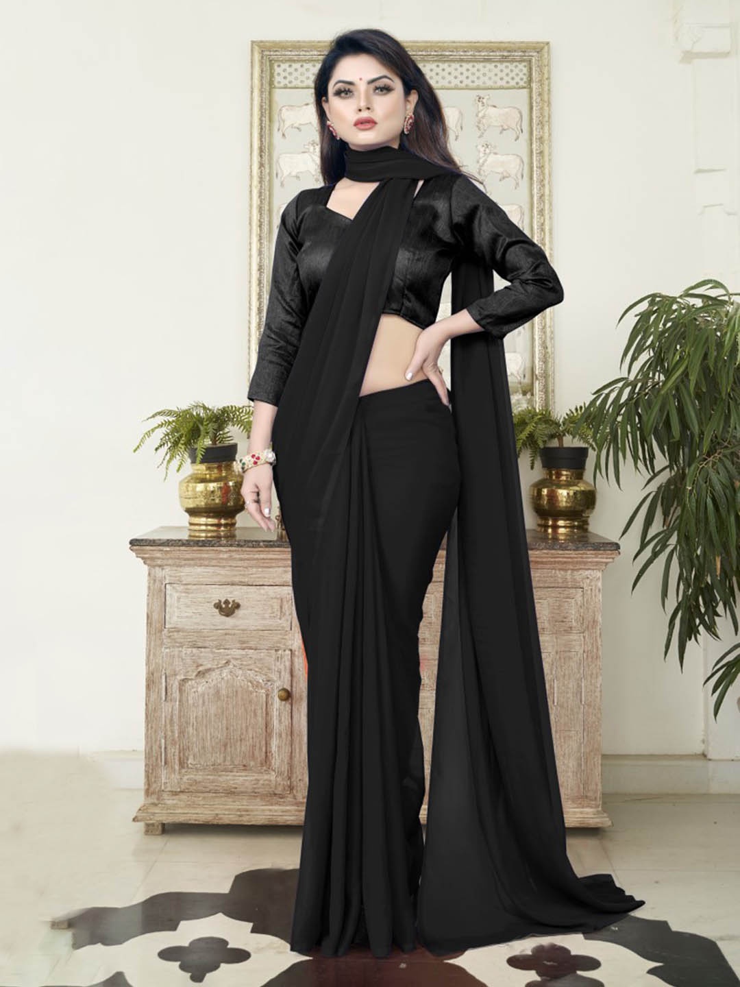 

CLOMITA Black Solid Pure Georgette Saree
