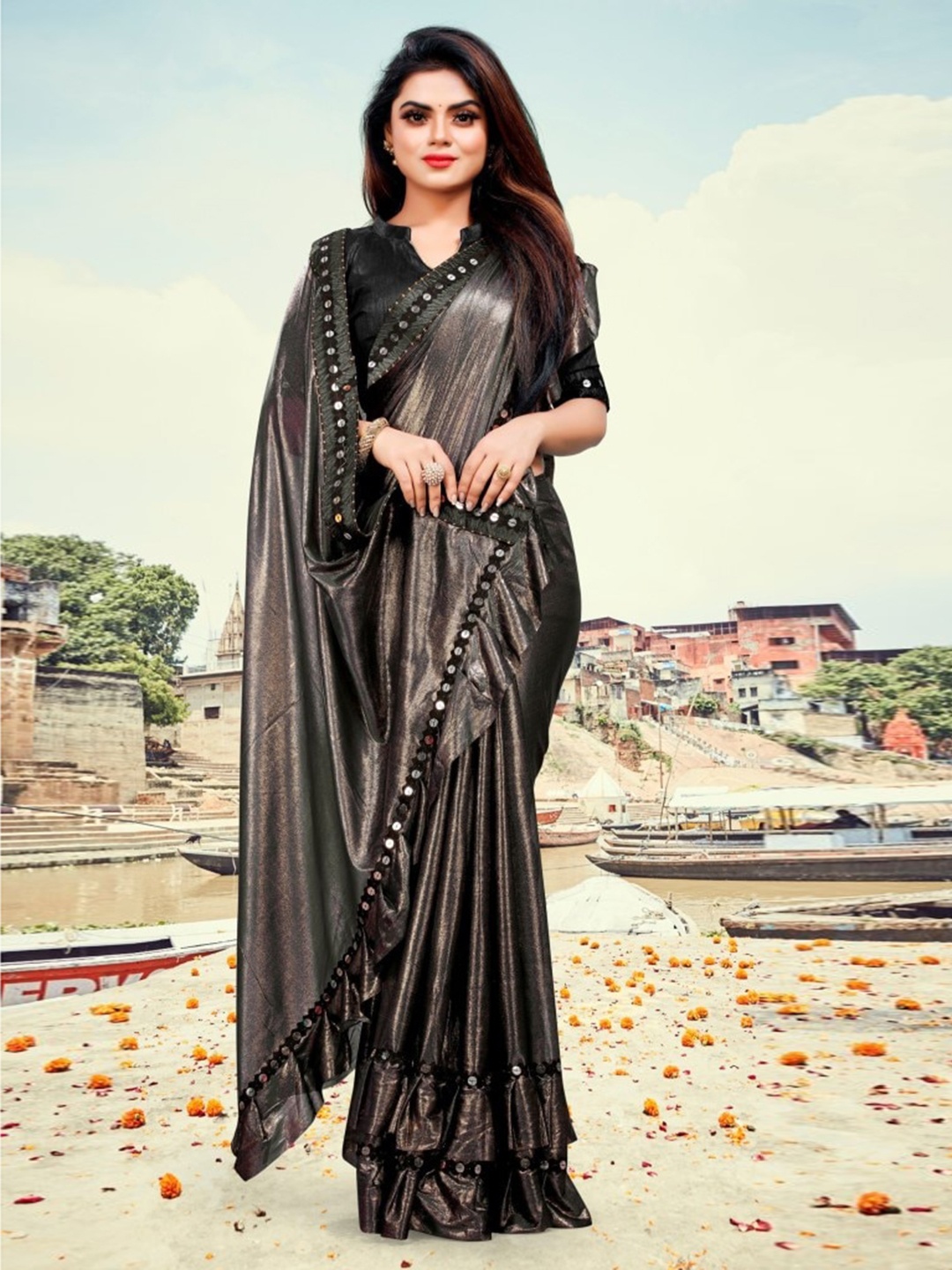 

CLOMITA Black & Golden Ruffled Mirror Work Saree