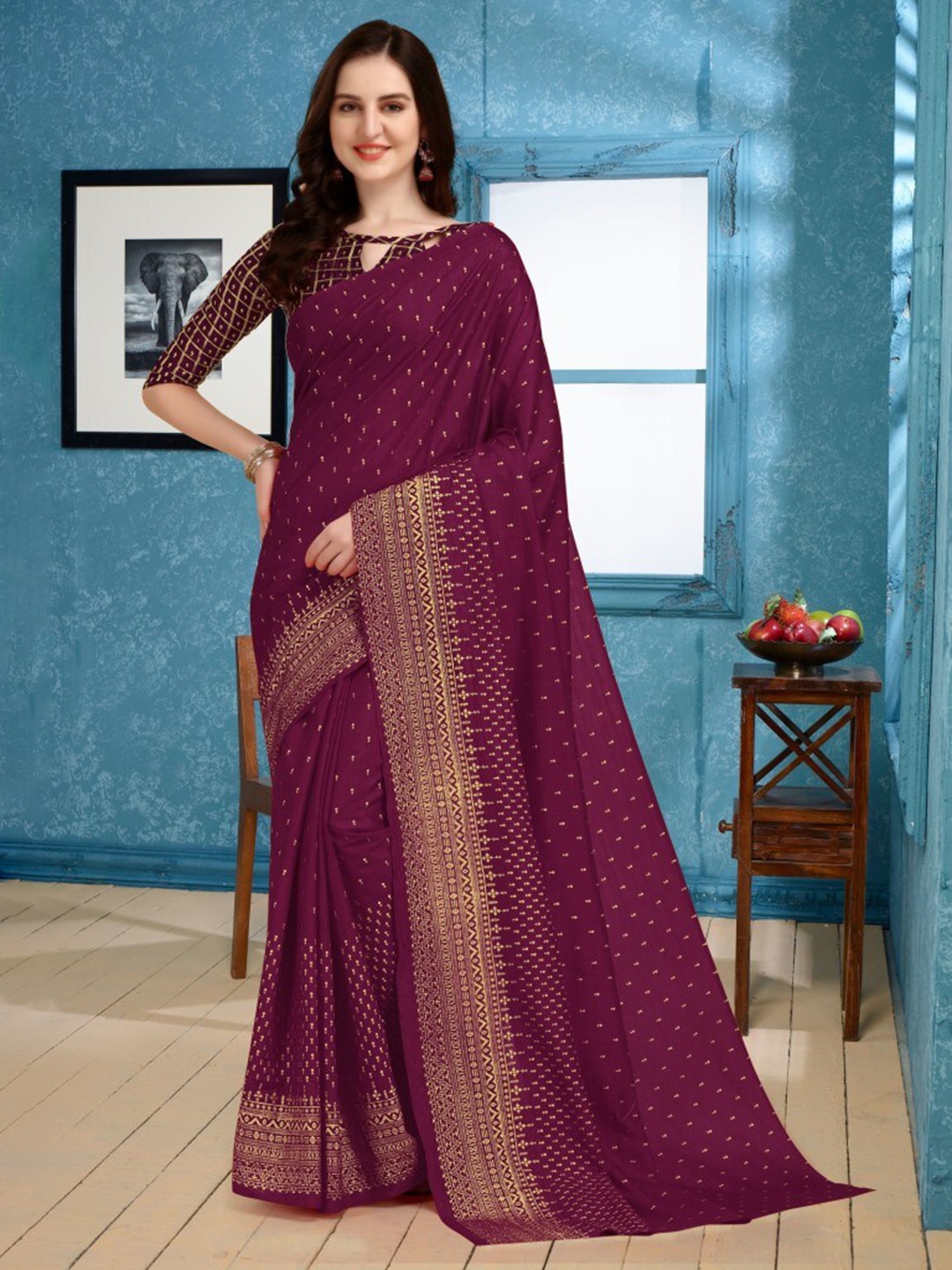 

CLOMITA Burgundy & Gold-Toned Ethnic Motifs Art Silk Saree