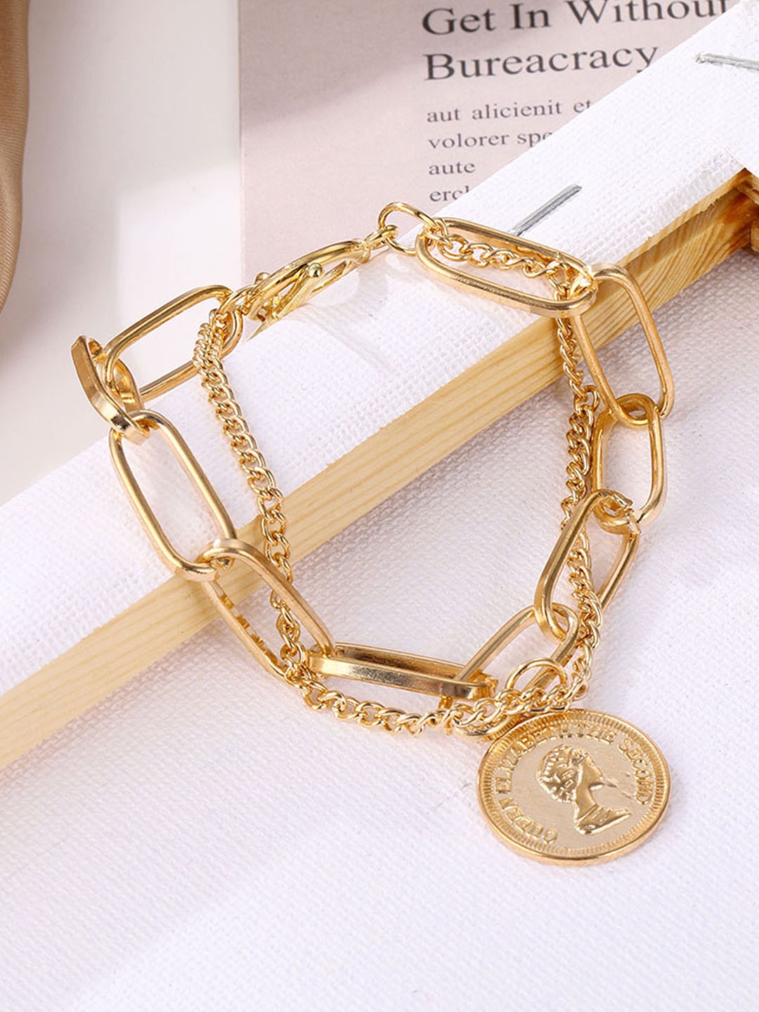 

Vembley Women Gold-Toned Gold-Plated Charm Bracelet
