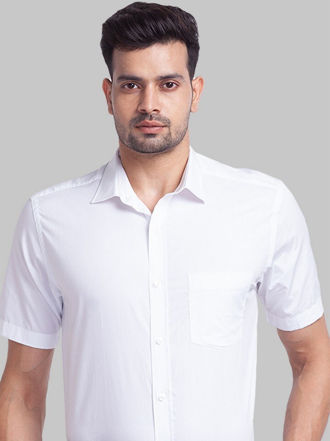 

Park Avenue Men White Solid Slim Fit Formal Shirts