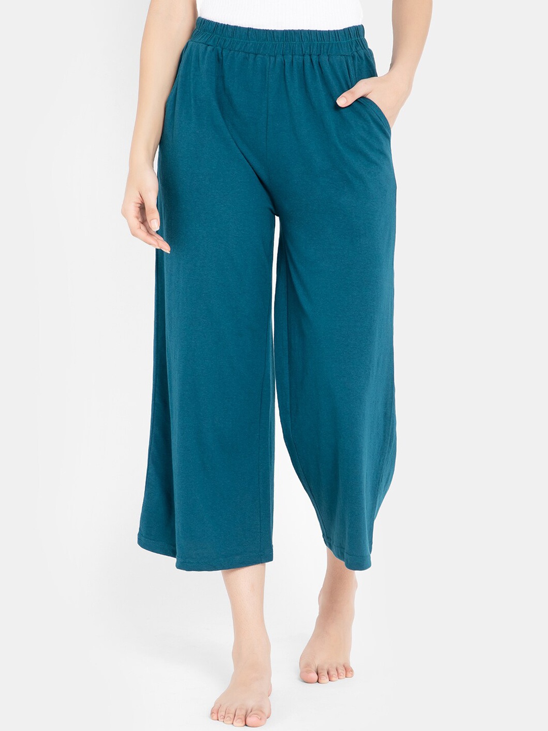 

Clovia Women Teal Blue Solid Pure Cotton Flared Lounge Pants