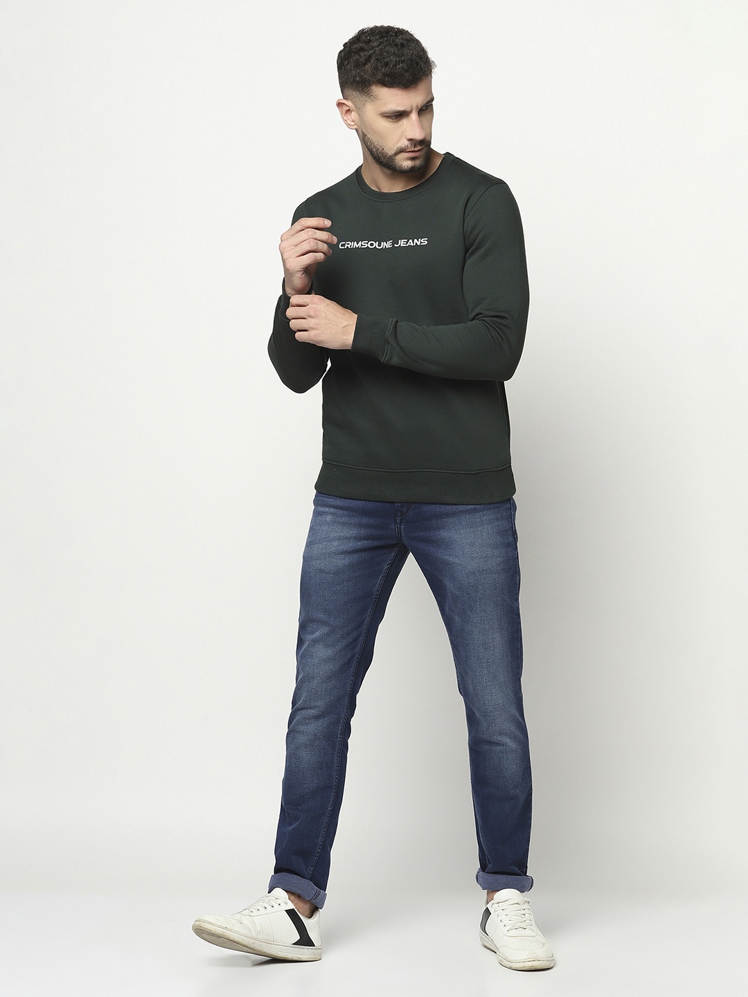 

Crimsoune Club Men Green Solid Sweatshirt