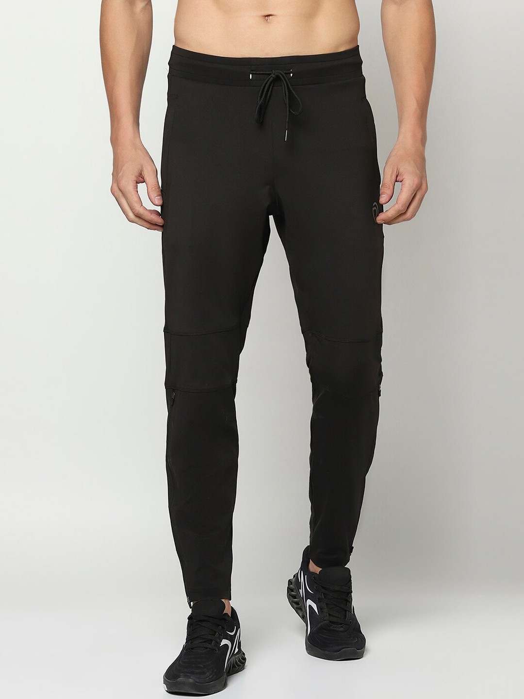 

Truerevo Men Black Solid Track Pants
