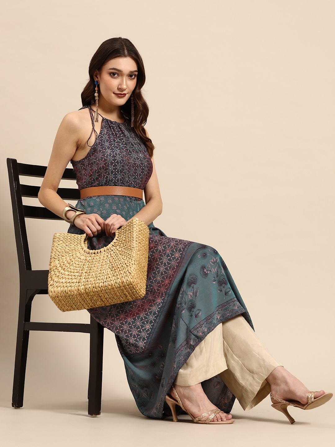 

Sangria Teal Ethnic Motifs Halter Neck Net Maxi Ethnic Dress