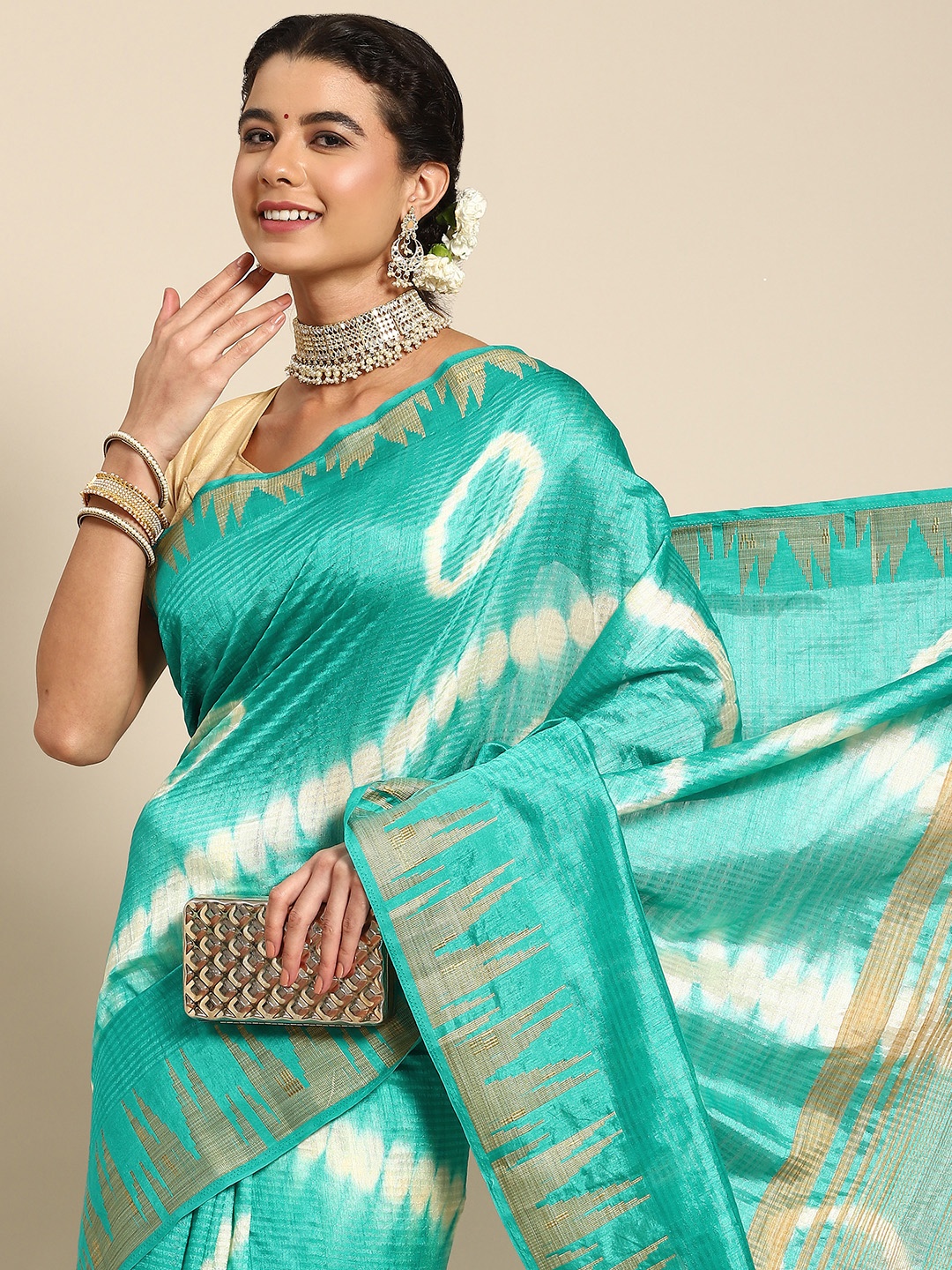 

Nimayaa Turquoise Blue & Gold-Toned Ethnic Motifs Zari Silk Blend Banarasi Saree