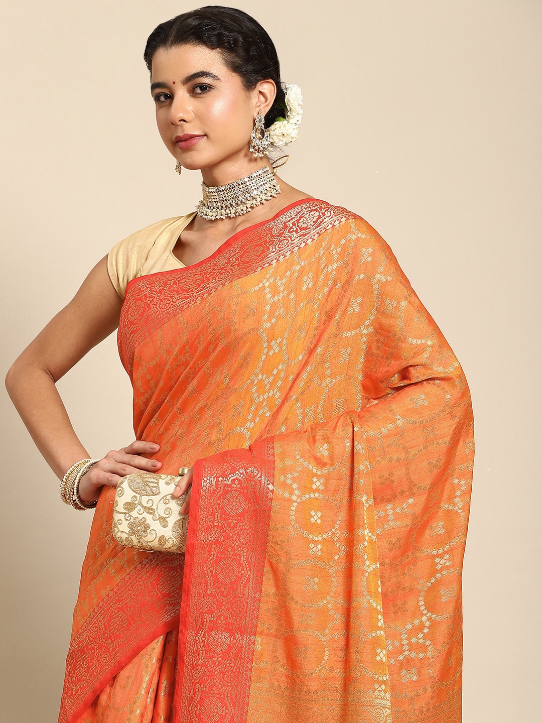 

Nimayaa Orange & Golden Ethnic Motifs Zari Silk Blend Banarasi Saree