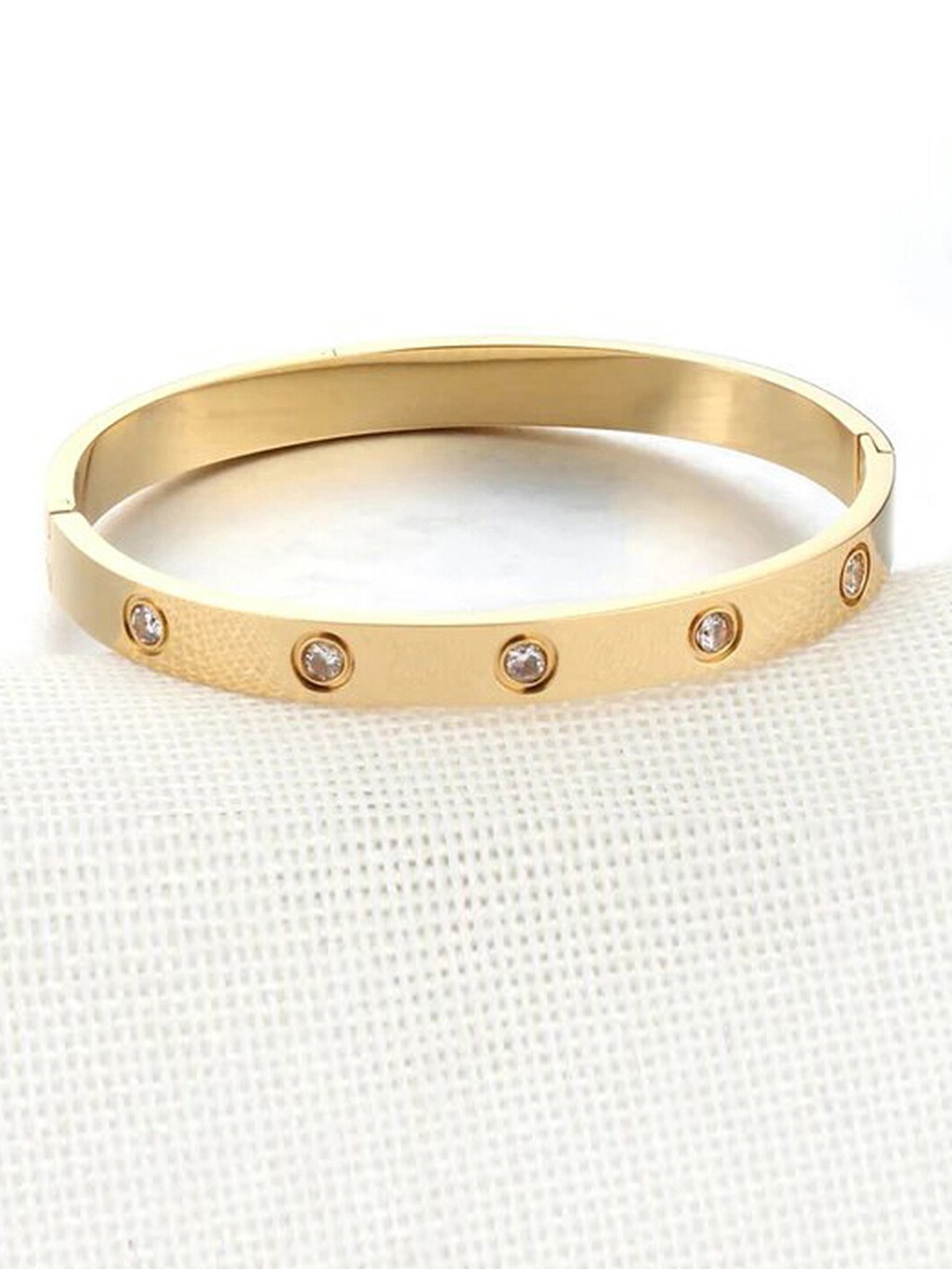

Jewels Galaxy Women White American Diamond Gold-Plated Bangle-Style Bracelet