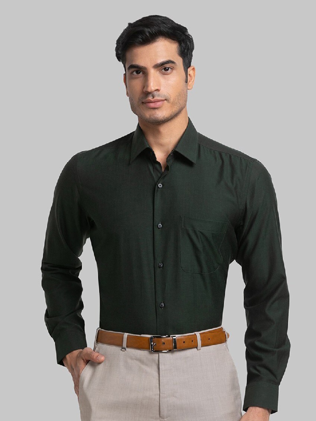 

Raymond Men Green Solid Pure Cotton Casual Shirt