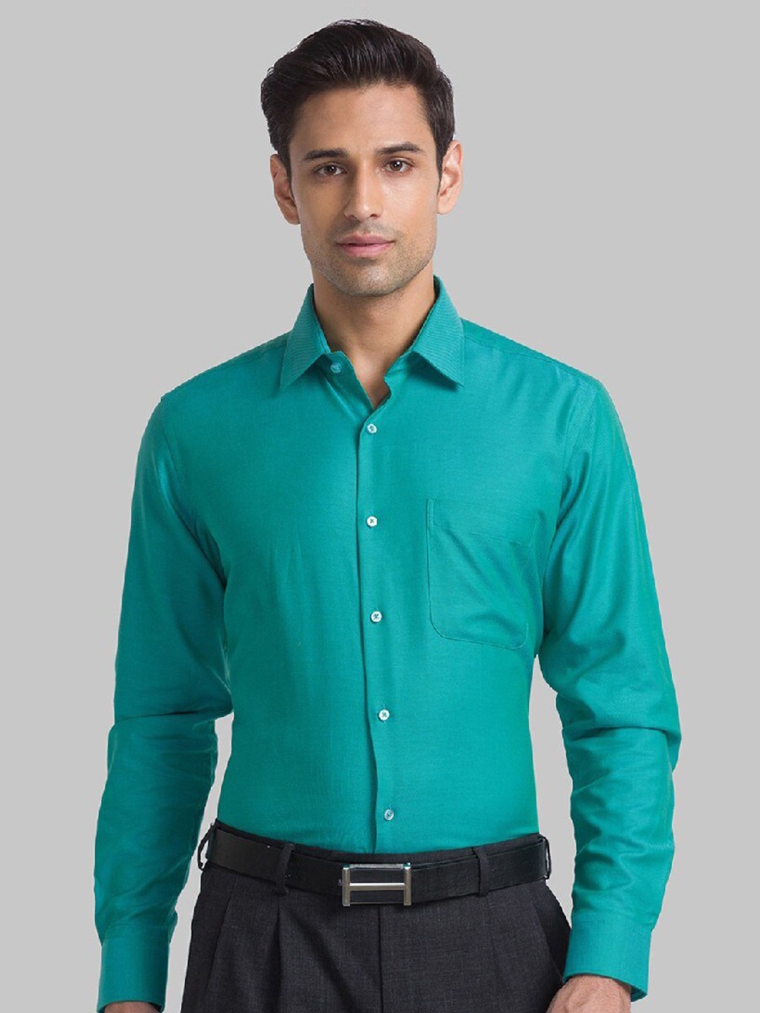 

Raymond Men Green Solid Pure Cotton Casual Shirt