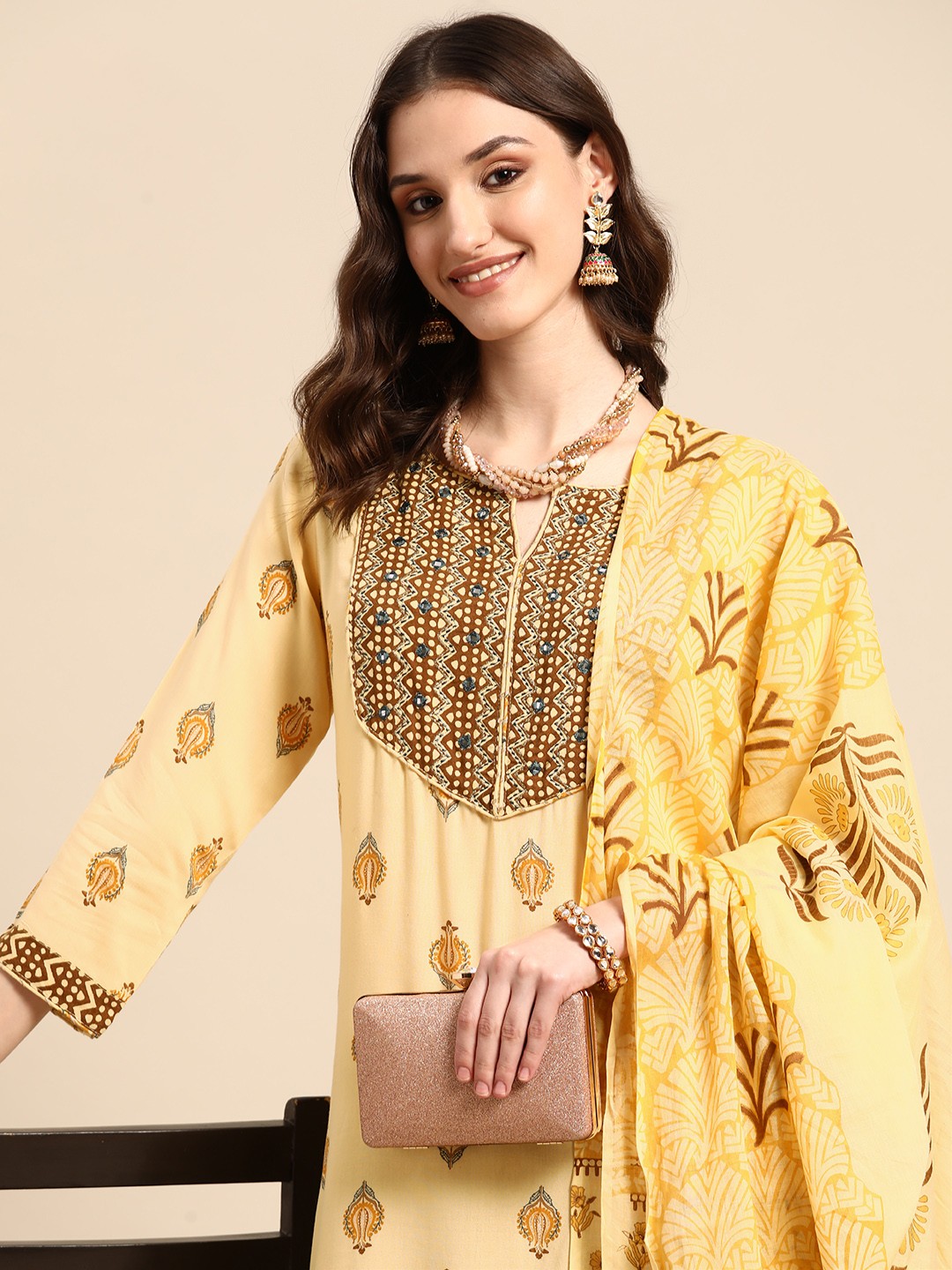 

Sangria Women Yellow Ethnic Motifs Printed Thread Work Kurta with Trousers & Dupatta