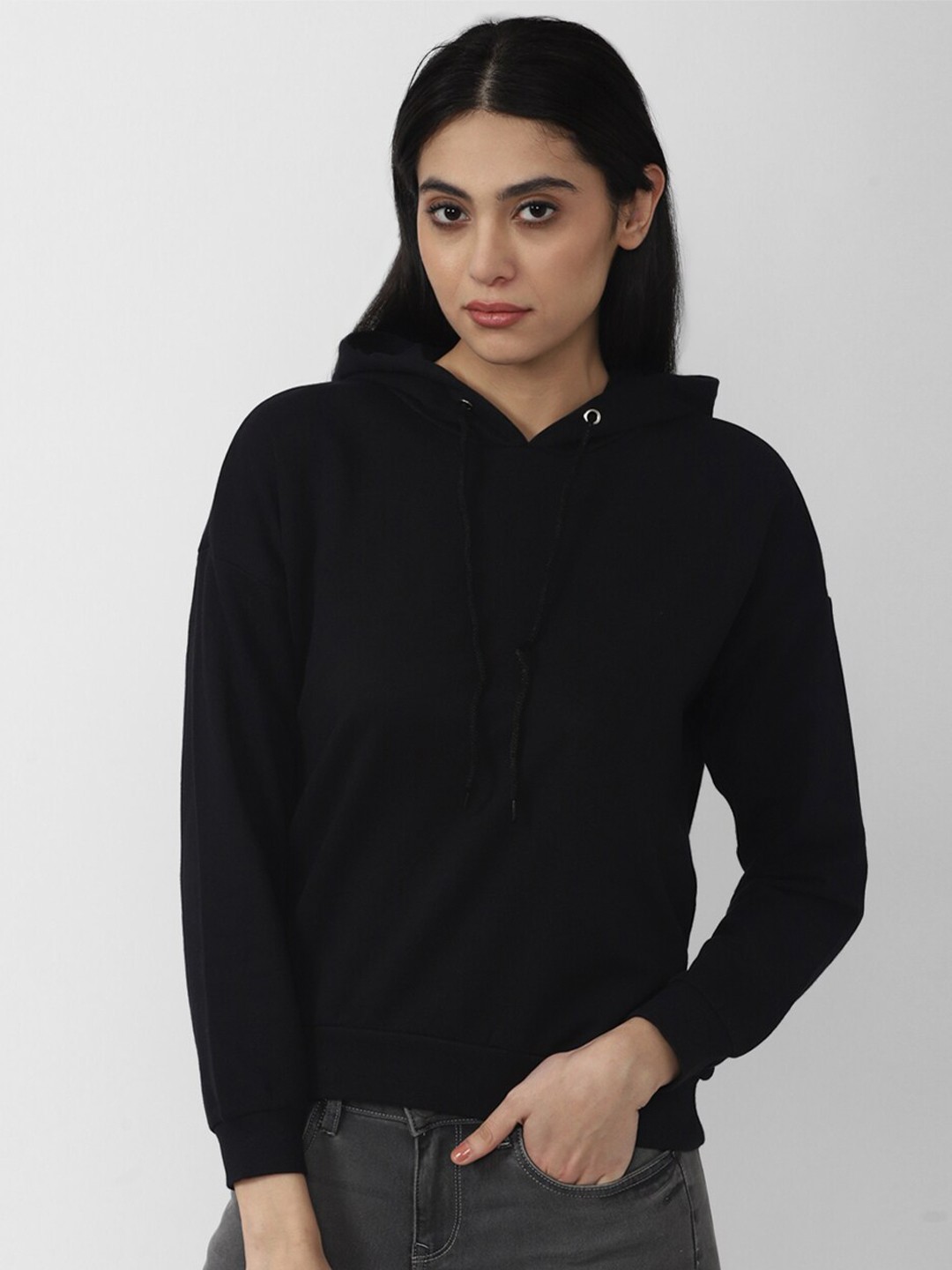 

Van Heusen Woman Black Solid Hooded Sweatshirt