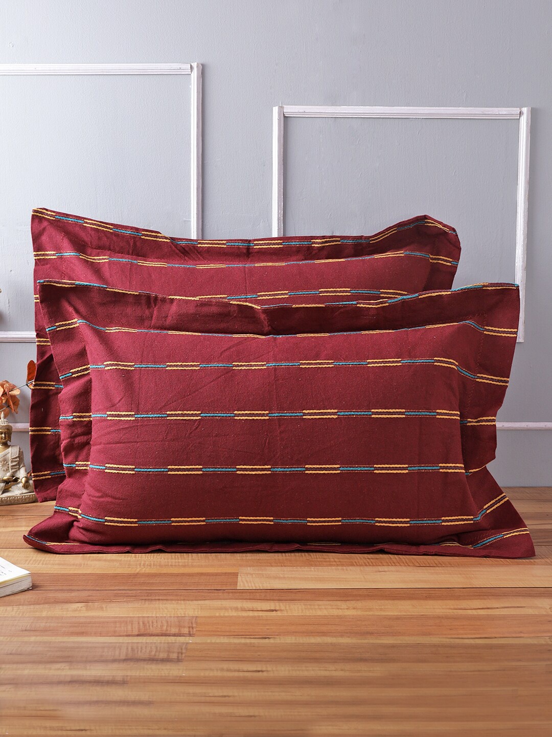 

Soumya Set Of 2 Maroon Self Design Pillow Covers