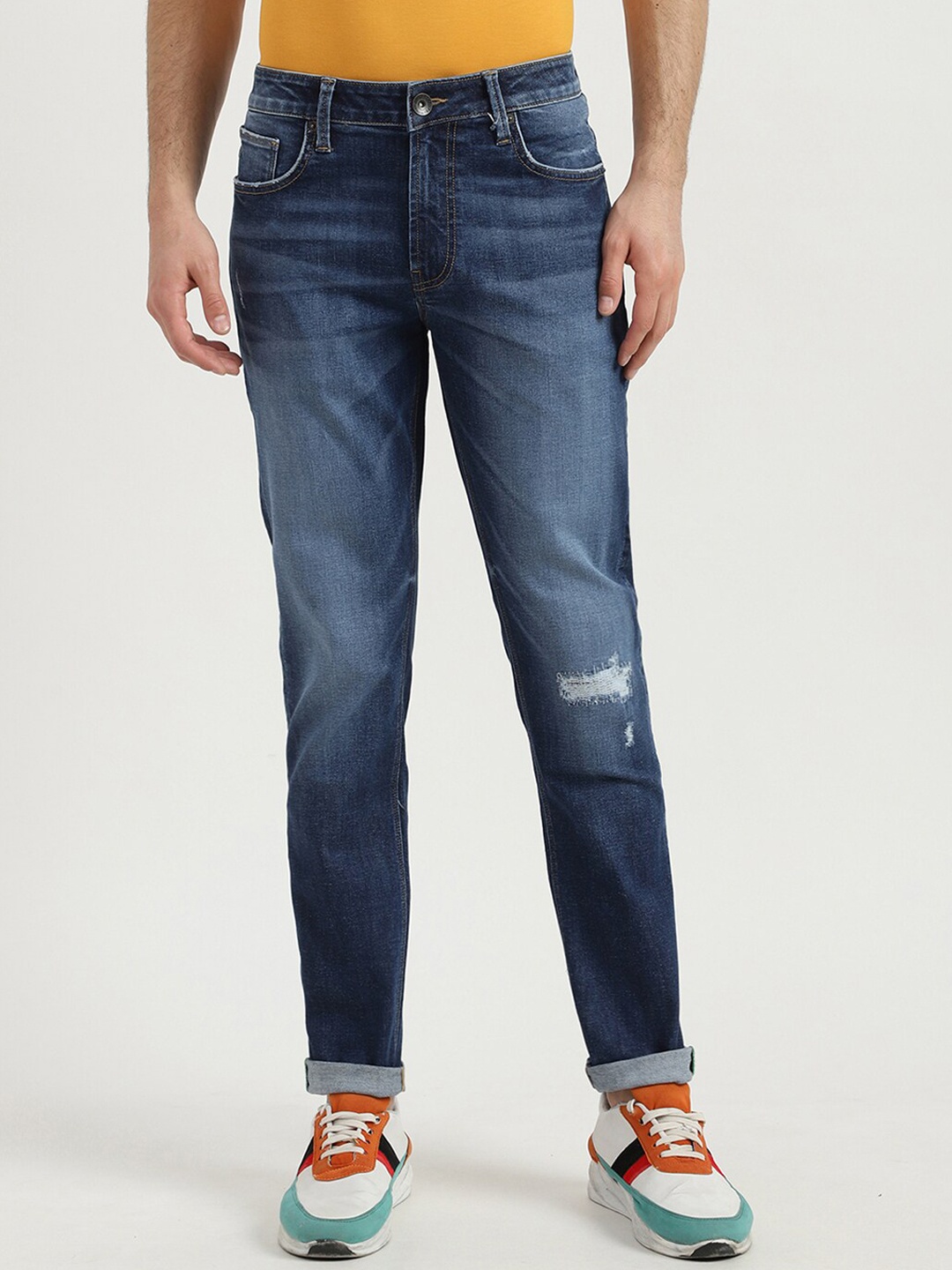 

United Colors of Benetton Men Blue Slim Fit Mildly Distressed Heavy Fade Jeans