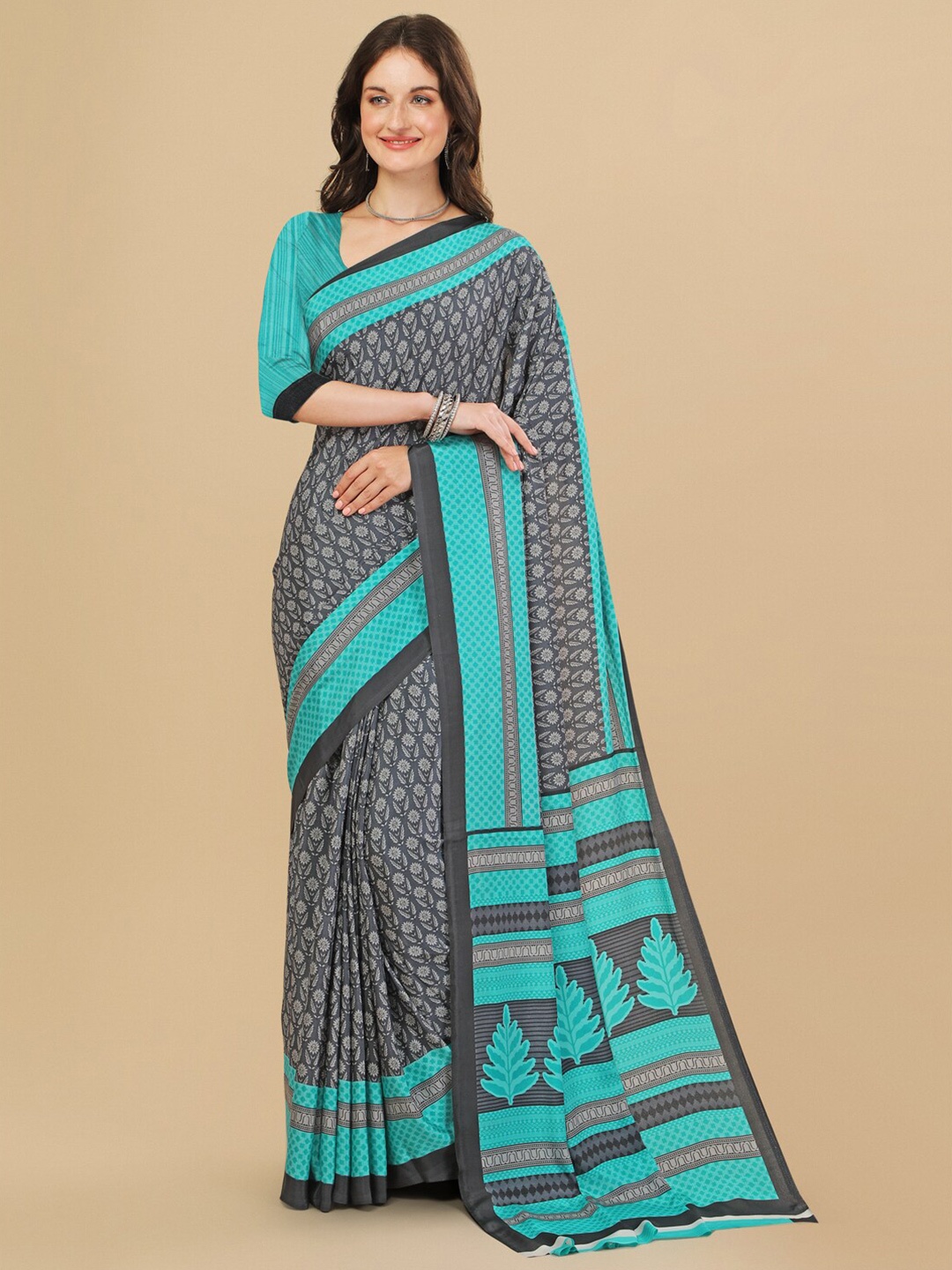 

Sangria Grey & Green Ethnic Motifs Pure Crepe Saree