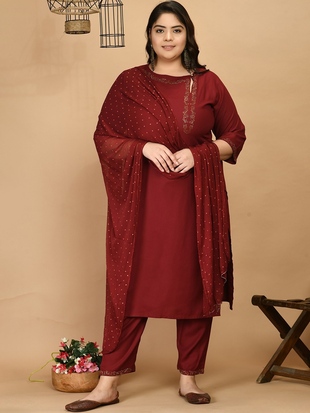 

PrettyPlus by Desinoor com Women Maroon Ethnic Motifs Beads and Stones Kurta with Trousers & With Dupatta
