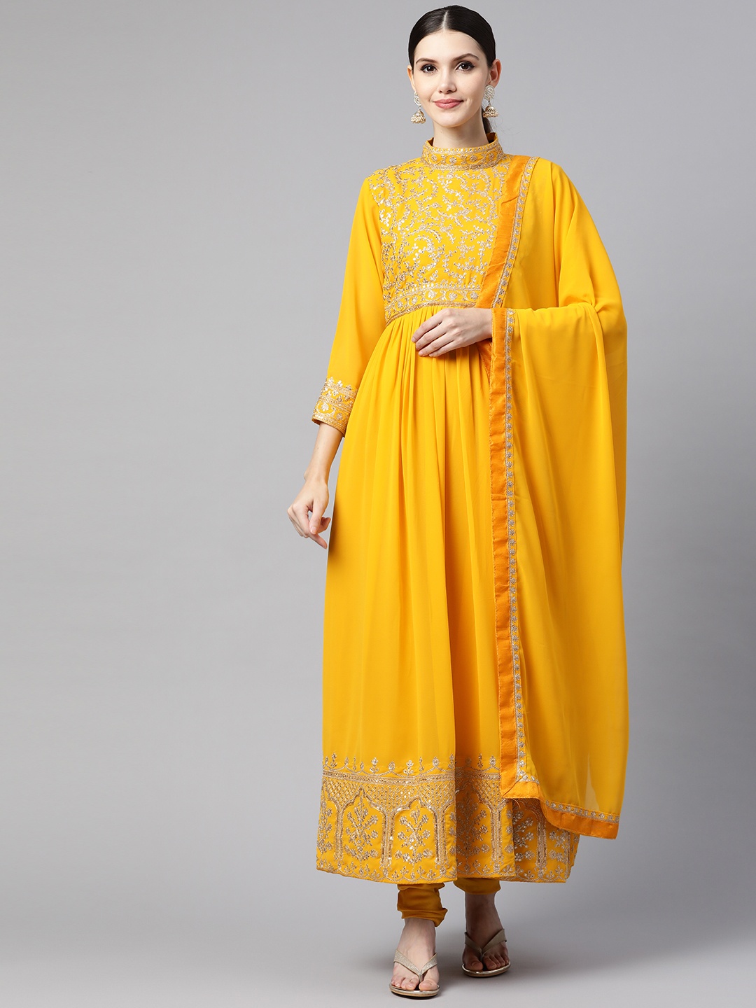

Readiprint Fashions Mustard Embroidered Semi-Stitched Dress Material