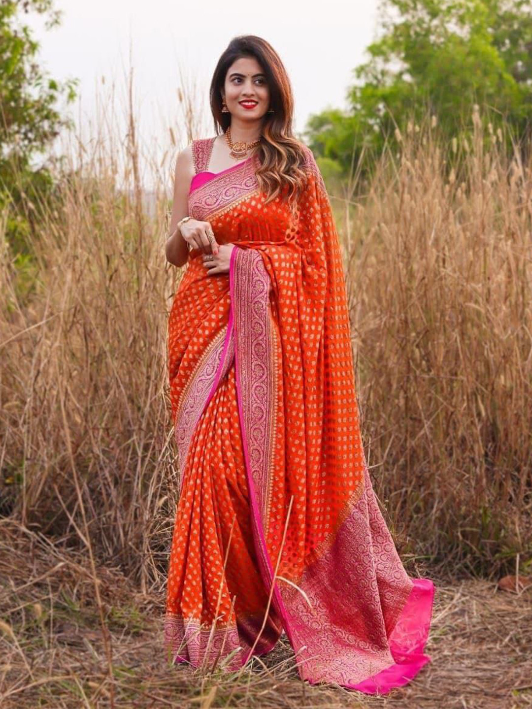 

Wuxi Orange & Pink Woven Design Zari Pure Silk Banarasi Saree