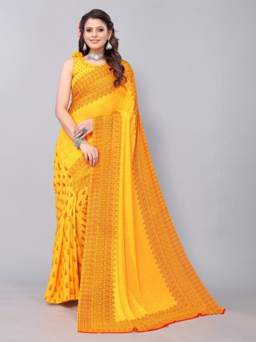 

Yashika Yellow & Orange Floral Saree