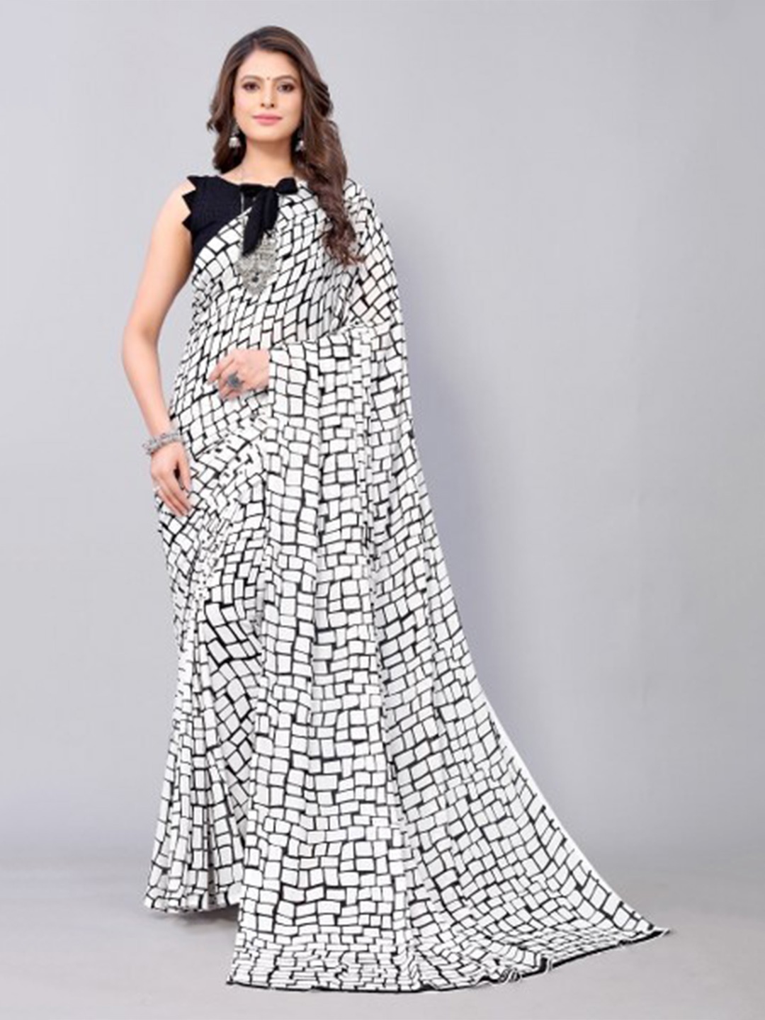 

Yashika Black & White Saree