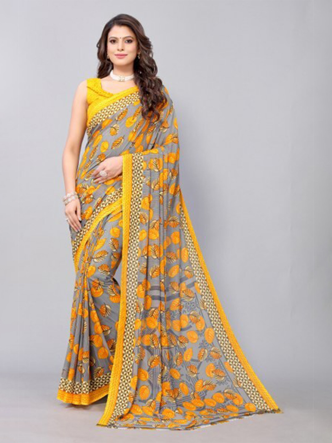 

Yashika Yellow & Grey Floral Saree
