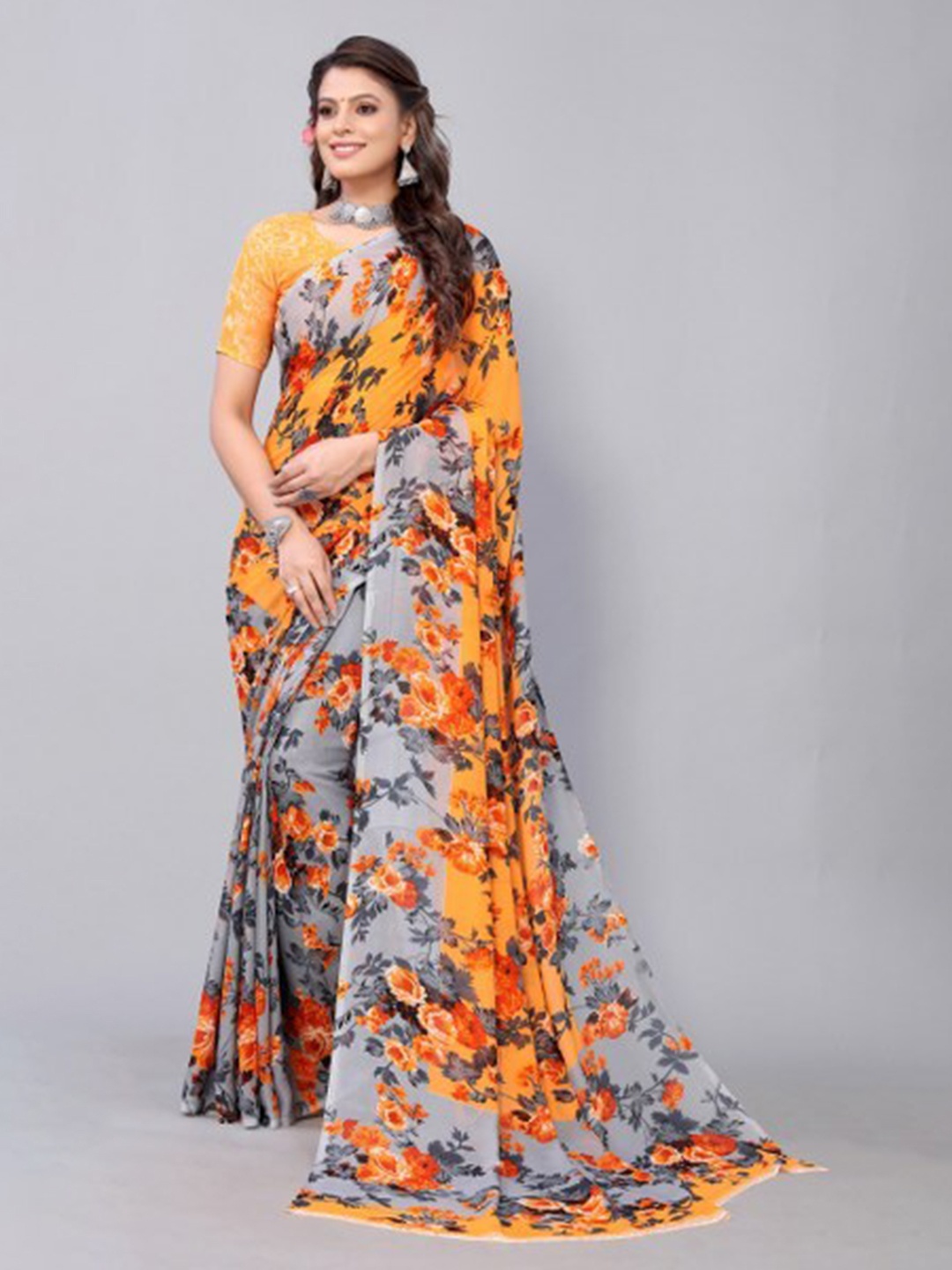 

Yashika Orange & Grey Floral Saree