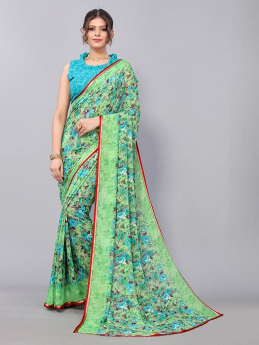 

Yashika Green & Blue Floral Saree